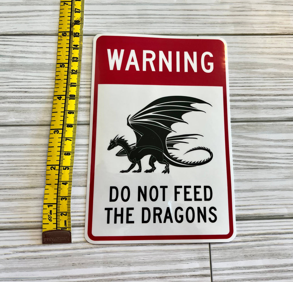Don't Feed the Dragons sticker